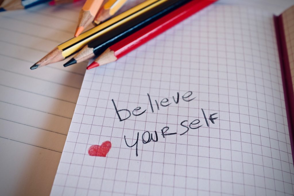 notebook, pencils, quote